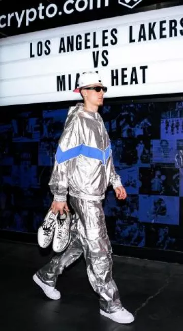 Golden Goose Metallic Silver & Blue-Stripe Windbreaker worn by Tyler Herro on the Instagram account @nolimitherro