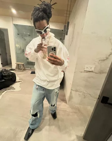 Balenciaga White 'Gotham Cat' Sunglasses (BB0284S) worn by Wiz Khalifa on the Instagram account @wizkhalifa