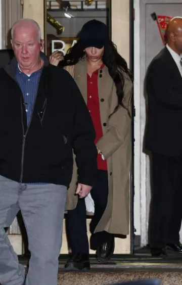 The Row Denise Coat worn by Zoe Kravitz in New York City on December 8, 2023