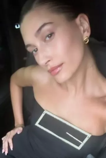 16Arlington Althenea Mini Dress worn by Hailey Bieber on her Instagram Story on January 1, 2024