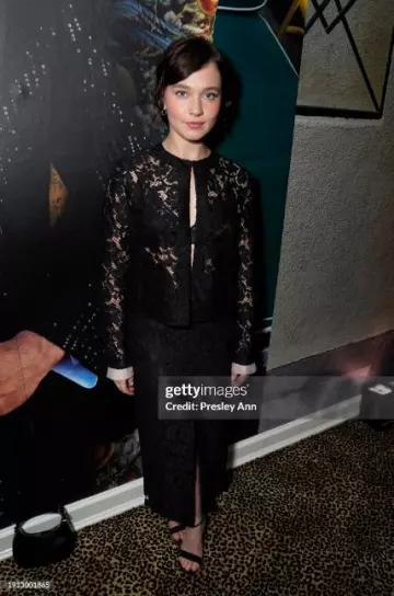 Miu Miu Floral Lace Detail Midi Skirt worn by Cailee Spaeny at W Magazine’s Annual Best Performances Party on January 5, 2024