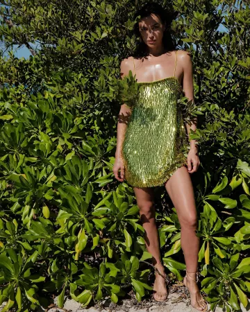 Retrofete Nara Sequin Feather Dress worn by Irina Shayk on the Instagram account @irinashayk
