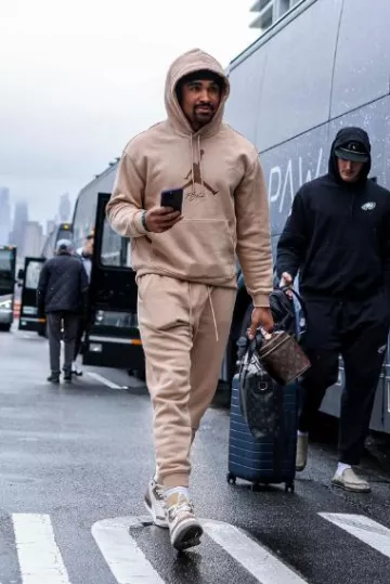 Jordan Beige Flight Logo Baseline Sweatpants worn by Jalen Hurts on the Instagram account @jalenhurts