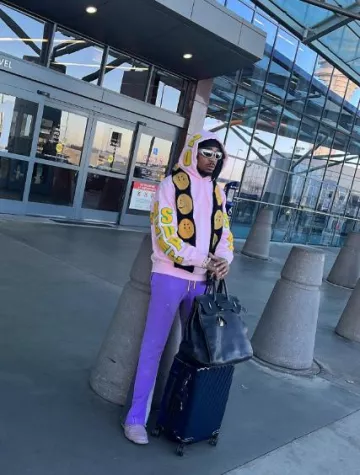 Gallery Dept. Purple Paint Splatter Flared Sweatpants worn by Quavo on the Instagram account @quavohuncho