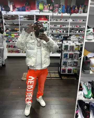 Moncler Ivory & Silver Camo 'Granero' Down Jacket worn by Sleepy Hallow on the Instagram account @_sleepyhallow_