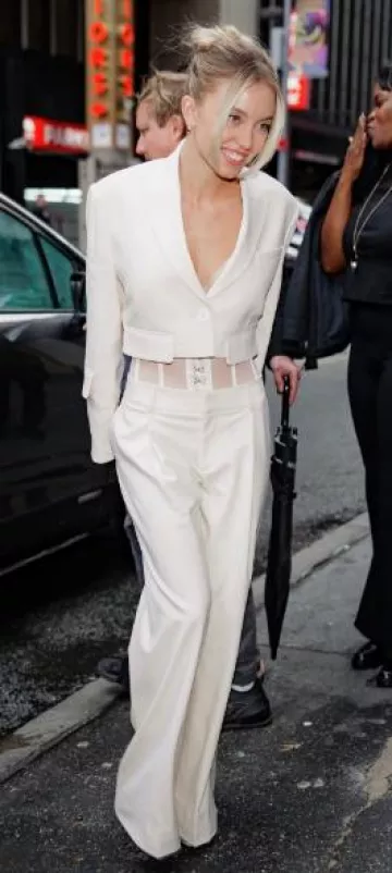 Monse Mesh Bustier Trousers worn by Sydney Sweeney at The Drew Barrymore Show on December 11, 2023