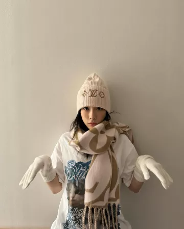 Louis Vuitton Lv Medallion Scarf worn by  Taeyeon on her Instagram Post on December 16, 2023