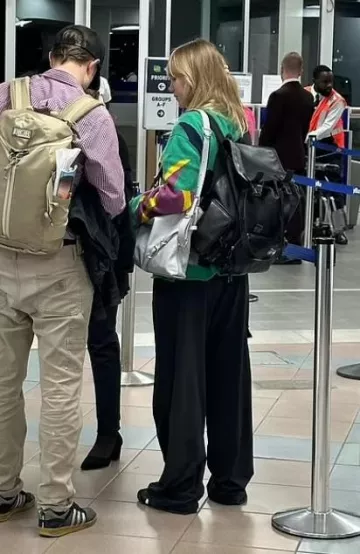 Dior Homme Backpack worn by  Suki Waterhouse at St. Lucia Airport on December 18, 2023