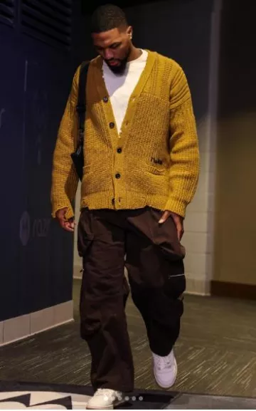 Marni Maize Brown Distressed Cardigan worn by Damian Lillard on the Instagram account @dame_.lillard