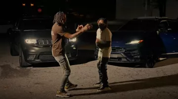 Jeans Amiri Clay Indigo & Camo Core Logo porté par Boss Top en Jackboy - IDK (Official Video) (feat. Boss Top)
