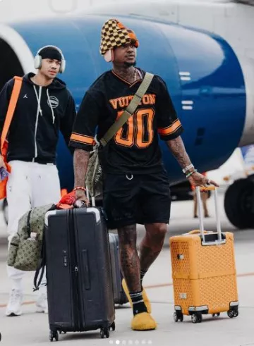 Marni Yellow Fur 'Fussbett Sabot' Slippers worn by Terry Rozier on the Instagram account @rozierlegion