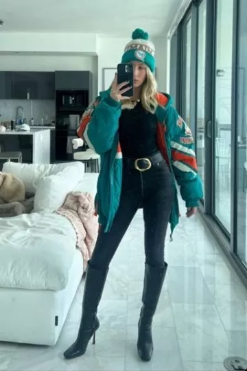 Starter Miami Dolphins Jacket worn by Alix Earle at Kansas City Chiefs Miami Dolphins Game on January 13, 2024