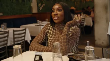 Fendi Envelope Flat Pouch Zucca Embossed Leather Large worn by Wendy Osefo as seen in The Real Housewives of Potomac (S08E09)