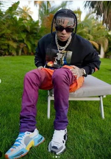 Dolce & Gabbana White Light Blue & Orange 'Airmaster' Sneakers worn by 6ix9ine on the Instagram account @6ix9ine