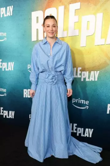 Carolina Herrera Floral Embellished Gathered Striped Cotton Poplin Maxi Skirt worn by Kaley Cuoco at Role Play Screening on January 12, 2024