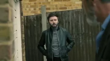 Bolongaro Trevor Bomber Jacket in Black with Checked Pocket Detail worn by Ashley Taylor (James Buckley) as seen in Finders Keepers (S01E01)