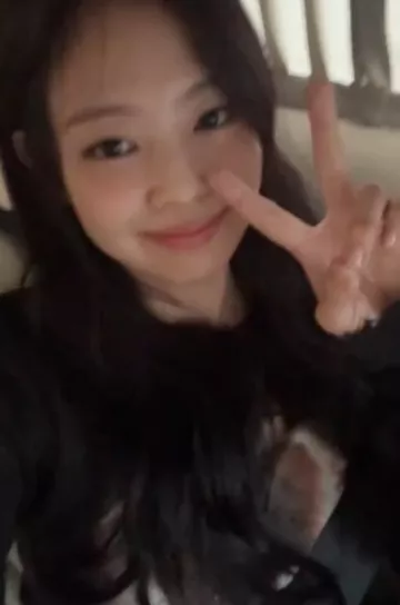 R13 Burning Heart Baby Crewneck worn by Jennie Kim at Weverse Live on January 18, 2024