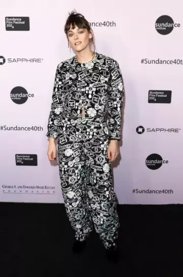 Chanel Shiny Calfskin Metal CC Loafers worn by Kristen Stewart at Sundance Film Festival 2024 on January 18, 2024