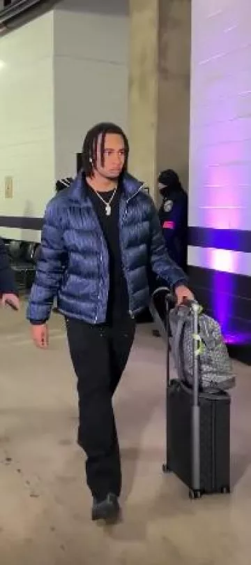 Dior Navy Blue Oblique Puffer Jacket worn by CJ Stroud on the Instagram account @cj7stroud