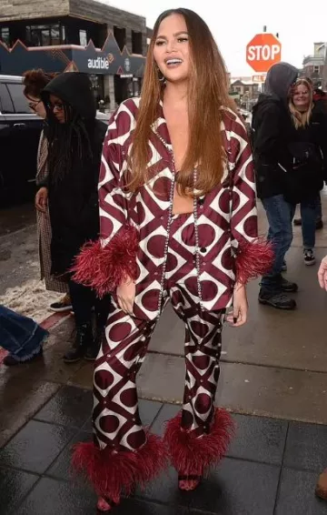 Gucci Customized Piped Printed Silk-Twill Shirt worn by Chrissy Teigen at Sundance Film Festival on January 21, 2024