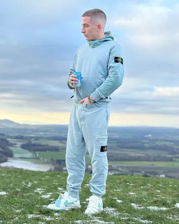 Stone Island Light Sly Blue Nylon Panel Hoodie worn by ArrDee on the Instagram account @arrdeegram