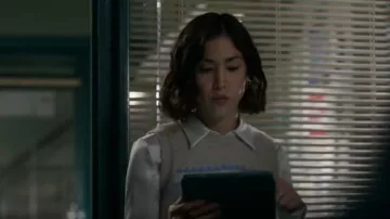 Sandro Paris Sleeve­less Sweater worn by Violet Yee (Connie Shi) as seen in Law & Order (S23E02)