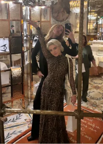 Valentino Loco Vlogo Flap Leather Shoulder Bag worn by Florence Pugh in Paris on January 23, 2024