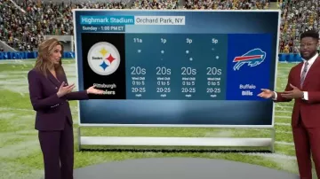 Pantalones Veronica Beard Ollie en berenjena oscura usados por Stephanie Abrams como se ve en CBS Mornings el 12 de enero de 2024