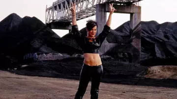 Costumes of Charlie's Angels: Full Throttle: Pink wears Black Leather Costume with Boots to portray Coal Bowl Starter in the movie