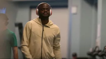Nike Mens Tech Fleece Jacket in Yellow worn by Frances Tiafoe as seen in Break Point (S02E06)