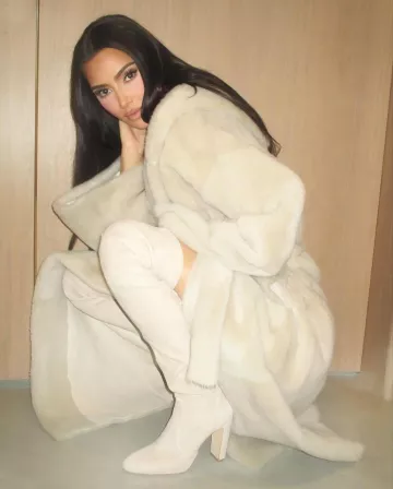 Stuart Weitzman Tieland Over The Knee Boots worn by Kim Kardashian on her Instagram post on February 2, 2024