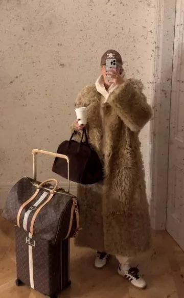 Celine Triomphe Baseball Cap in Cotton Marron Glace worn by Leonie Hanne on her Instagram on February 1, 2024