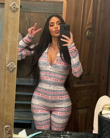 Skims Logo Plush Pointelle Henley Onesie in Opal Fair Isle worn by Kim Kardashian on her Instagram on February 1, 2024