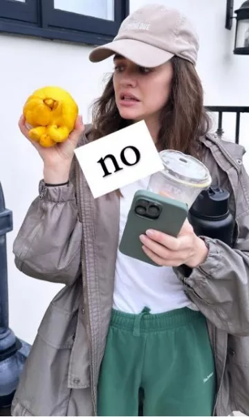 Apple Silicone Case with Magsafe in Cypress worn by Lucy Hale on her Instagram Story on February 1, 2024