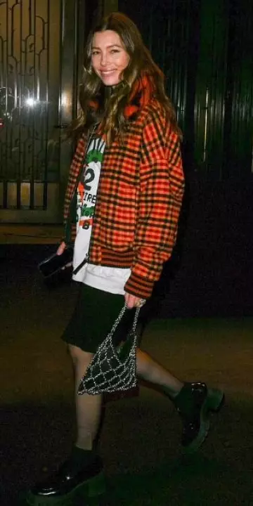 Marni Orange Check Shearling Bomber Jacket worn by Jessica Biel in New York City on January 27, 2024