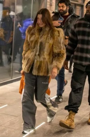 Bottega Veneta The Pouch Bag worn by Hailey Baldwin in Canada post on February 3, 2024