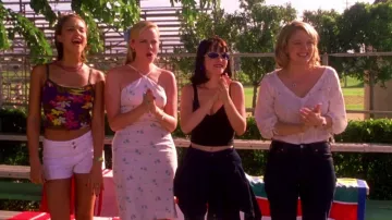 Camiseta sin mangas morada de Custo española de los 90 usada por Kirsten (Jessica Alba) como se ve en Never Been Kissed