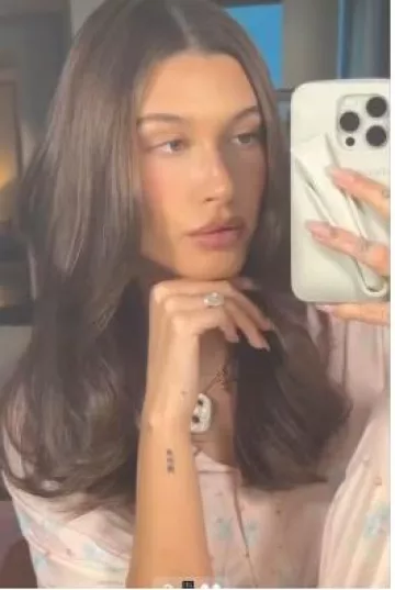 Djerf Avenue Go Slow Shirt worn by Hailey Bieber on her Instagram Story on February 9, 2024