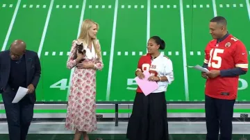 Alessandra Rich Rose Print Silk Midi Dress worn by Beth Ostrosky Stern as seen in Today on February 9, 2024