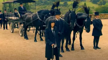 Saint Laurent Sin­gle Breast­ed Coat worn by Claudia Winkleman as seen in The Traitors (S02E06)