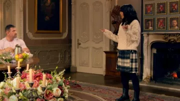 Le Kilt Mini Checked Wool Blend Wrap Skirt worn by Claudia Winkleman as seen in The Traitors (S02E07)