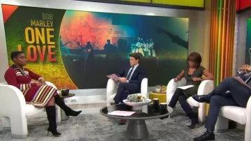 Jupe mi-longue en tricot côtelé Wales Bonner Wander portée par Lashana Lynch dans CBS Mornings le 13 février 2024