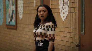 Maeve Cardi­gan Sweater worn by Janine Teagues as seen in Abbott Elementary (S03E04)