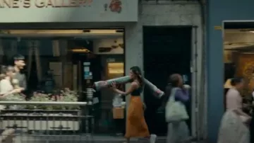 Vince Drape Skirt worn by Hilary Starr (Sarayu Rao) as seen in Expats (S01E06)