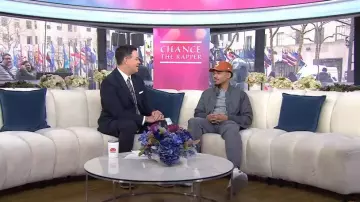 Moncler Aver Down Reversible Jacket in Graphite Gray worn by Chance The Rapper as seen in Today on February 26, 2024