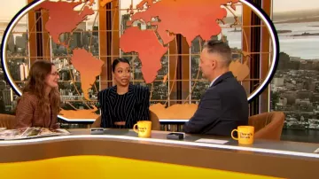 Norma Kamali Cropped Shoulder Pad Top worn by Liza Koshy as seen in The Drew Barrymore Show on February 20, 2024