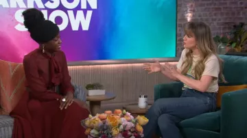 Sergio Hudson Scarf-Neck Pleated Asymmetric Midi Dress worn by Kelly Clarkson as seen in The Kelly Clarkson Show on February 27, 2024