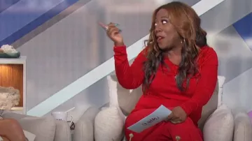 Karen Kane Twist Keyhole Neck Top worn by Sheryl Underwood as seen in The Talk on February 28, 2024