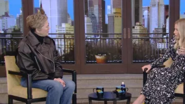 Agolde Remi Crop Leather Biker Jacket worn by Annette Bening as seen in LIVE with Kelly and Mark on March 6, 2024