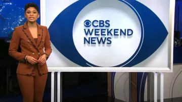 Veronica Beard Arte Stretch Flare Slit Pants worn by Jericka Duncan as seen in CBS Evening News with Norah O'Donnell on March 4, 2024